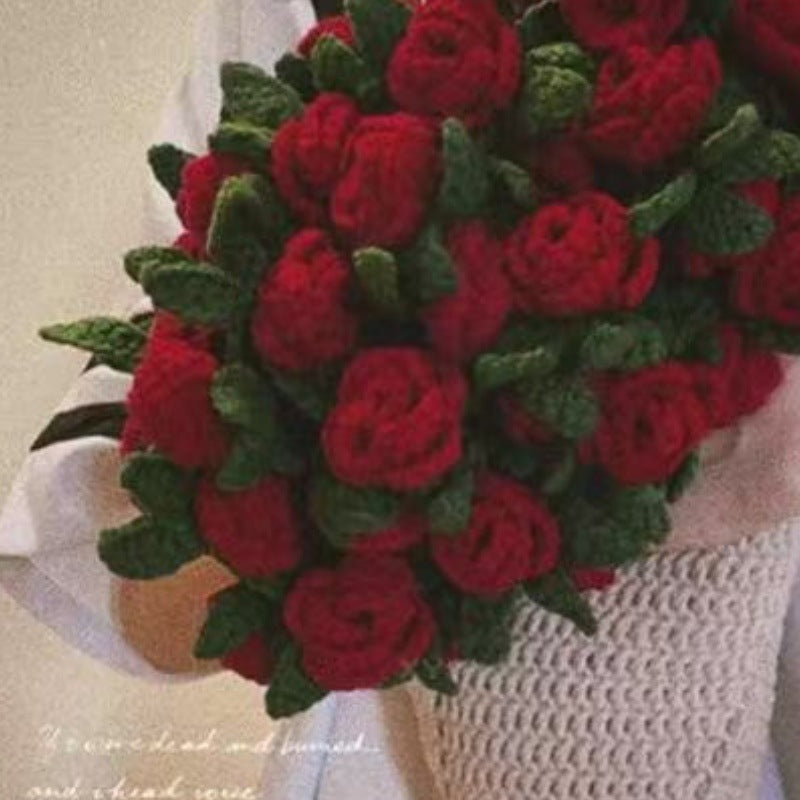 handmade crochet blanket folded to look like a stunning bouquet of roses